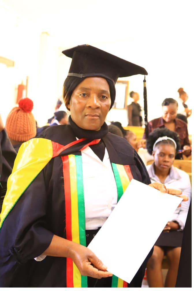 Graduate in cap and gown